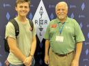 2021 Alan G. Thorpe, K1TMW, Memorial Scholarship winner Kaleb Ruddle, KN4JGJ (L), of Lawrenceburg, Tennessee, with ARRL President Rick Roderick, K5UR, at the 2021 ARRL Southeastern Division Convention. [Bob Inderbitzen, NQ1R, photo]